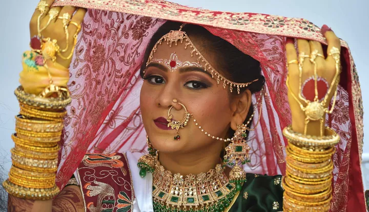 epa11820888 A Hindu bride attends a mass marriage ceremony in Karachi, Pakistan, 12 January 2025. Over 100 Hindu couples participated in a mass wedding ceremony organized by the Pakistan Hindu Council (PHC) on 12 January, aimed at alleviating the financial burden of wedding expenses for economically disadvantaged families. This event, part of an annual tradition established 16 years ago, involves a selection process where applicants are shortlisted based on their income and social status. EPA/SHAHZAIB AKBER