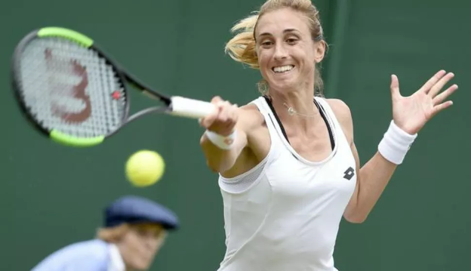 epa06065381 Petra Martic of Croatia in action against Daria Gavrilova of Australia during their first round match for the Wimbledon Championships at the All England Lawn Tennis Club, in London, Britain, 04 July 2017. EPA/GERRY PENNY EDITORIAL USE ONLY/NO COMMERCIAL SALES------3x color. sport