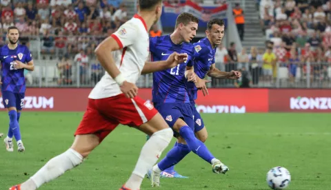 Osijek, 08. 09. 2024, Opus Arena, UEFA Nations League, nogometna utakmica Hrvatska - Poljska. Luka Sučić (21) i Ante Budimir (11).snimio Lu MITIĆ