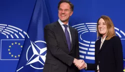 epa11822117 European Parliament President Roberta Metsola (R) welcomes NATO Secretary General Mark Rutte (L) for a bilateral meeting ahead of a hearing by the EU Parliament Foreign affairs committee in Brussels, Belgium, 13 January 2025. EPA/OLIVIER HOSLET