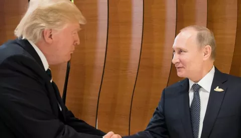 epa06072749 A handout photo made available by the German Government on 07 July 2017 of US President Donald J. Trump (L) shaking hands with Russian President Vladimir Putin during the retreat at the opening day of the G20 summit in Hamburg, Germany, 07 July 2017. The G20 Summit (or G-20 or Group of Twenty) is an international forum for governments from 20 major economies. The summit is taking place in Hamburg 07 to 08 July 2017. EPA/STEFFEN KUGLER HANDOUT HANDOUT EDITORIAL USE ONLY/NO SALES