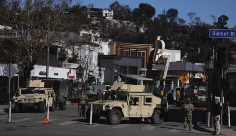 epa11822505 The California national guard set up a check point in an area impacted by the Palisades wildfire in the Pacific Palisades neighborhood of Los Angeles, California, USA, 13 January 2025. Multiple wildfires, which have already destroyed thousands of homes and forced thousands of people to evacuate neighborhoods, are continuing to burn across thousands of acres in Southern California in the Los Angeles area. EPA/ALLISON DINNER