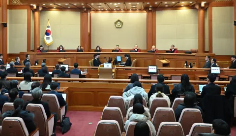 epa11822950 (L-R) Constitutional Court's Judge Chung Kye-sun, Kim Bok-hyeong, Jung Jung-mi, Lee Mi-son, acting head of the Constitutional Court Moon Hyung-bae and judge Kim Hyung-du, Cheong Hyung-sik and Cho Han-chang sit for the first formal hearing of a trial on the validity of President Yoon Suk Yeol's impeachment by the National Assembly at the constitutional court of Korea in Seoul, South Korea, 14 January 2025. EPA/KIM MIN-HEE/POOL