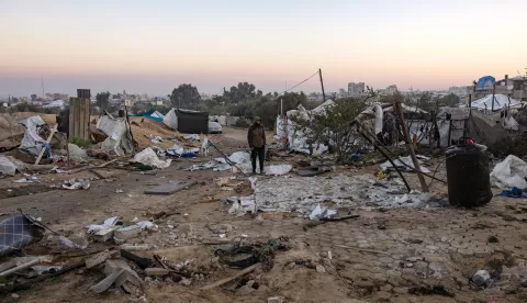 epa11801977 People inspect damage after an Israeli airstrike targeted an internally displaced persons camp in Al-Mawasi area, west of Khan Yunis, southern Gaza Strip, 02 January 2025, killing ten Palestinians, according to local Nasser Hospital. According to the UN, at least 1.9 million people (or nine in ten people) across the Gaza Strip are internally displaced, including people who have been repeatedly displaced. Since October 2023, only about 11 percent of the Gaza Strip has not been placed under Israeli-issued evacuation orders, the UN aid coordination office OCHA said. EPA/HAITHAM IMAD