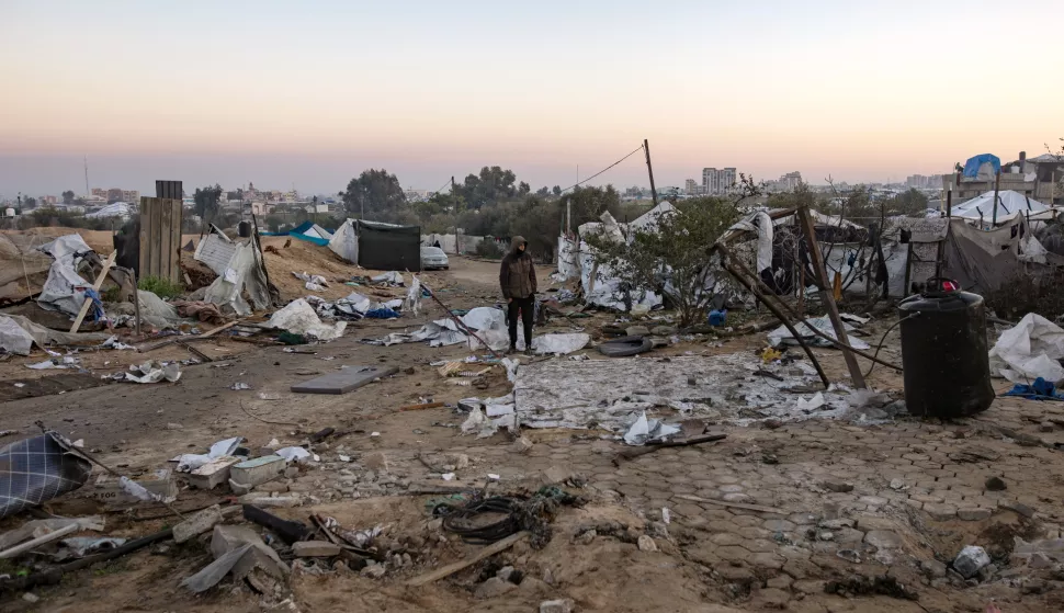 epa11801977 People inspect damage after an Israeli airstrike targeted an internally displaced persons camp in Al-Mawasi area, west of Khan Yunis, southern Gaza Strip, 02 January 2025, killing ten Palestinians, according to local Nasser Hospital. According to the UN, at least 1.9 million people (or nine in ten people) across the Gaza Strip are internally displaced, including people who have been repeatedly displaced. Since October 2023, only about 11 percent of the Gaza Strip has not been placed under Israeli-issued evacuation orders, the UN aid coordination office OCHA said. EPA/HAITHAM IMAD