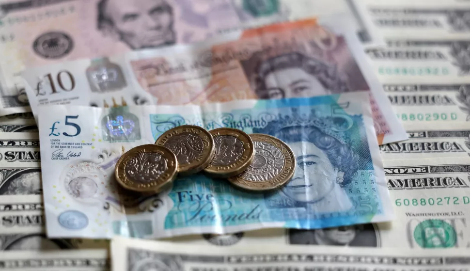 epa11816587 The British pound and US dollar banknotes in London, Britain, 10 January 2025. The British pound has fallen to its lowest level in fourteen months, while UK borrowing costs have hit their highest for 16 years amidst a deepening bond crisis. EPA/ANDY RAIN