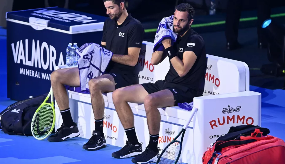 epa11714555 Marcelo Arevalo (L) of El Salvador and Mate Pavic of Croatia during a break in their Men's Doubles match against Kevin Krawietz of Germany and Tim Puetz of Germany (both not pictured) at the Nitto ATP Finals in Turin, Italy, 11 November 2024. EPA/ALESSANDRO DI MARCO