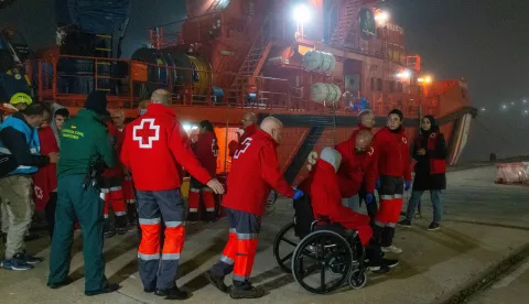 epa11023728 Several of the forty-six maghreb migrants who were rescued by Sea Rescue members at Alboran Island on the Mediterranean Sea, arrive to Motril's Port in Granada, Spain, 11 December 2023. EPA/ALBA FEIXAS