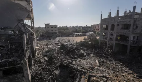 epa11803400 Palestinians inspect the destroyed house of the Abu Libda family following an Israeli air strike in Al Maghazi refugee camp, central Gaza Strip, 03 January 2025. According to reports from the Ministry of Health in Gaza at least nine members of the Abu Libda family were killed following an Israeli air strike in the refugee camp. More than 45,500 Palestinians and over 1,400 Israelis have been killed, according to the Palestinian Health Ministry and the Israeli Army, since Hamas militants launched an attack against Israel from the Gaza Strip on 07 October 2023 and the Israeli operations in Gaza and the West Bank that followed it. EPA/MOHAMMED SABER