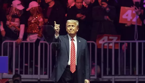 epa11837530 US President-elect Donald Trump arrives to address supporters at a rally at Capital One Arena in Washington, DC, USA, 19 January 2025.. President-elect Donald Trump, who defeated Joe Biden to become the 47th president of the United States, will be inaugurated on 20 January, though all of the planned outdoor ceremonies and events have been cancelled due to a forecast of extreme cold temperatures. EPA/WILL OLIVER