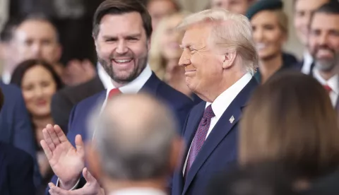 epa11839061 U.S. Vice President-elect J.D. Vance (L) applauds as U.S. President-elect Donald Trump reacts ahead of the inauguration ceremony of Donald Trump is sworn in as the 47th US President in the US Capitol Rotunda in Washington, DC, USA, 20 January 2025. EPA/KEVIN LAMARQUE/POOL