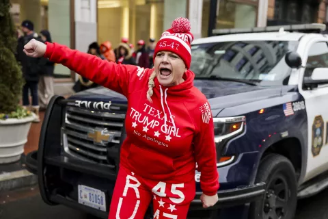 epa11837398 A woman yells pro-Trump slogans as people gather to attend a rally with US President-elect Donald Trump at Capital One Arena in Washington, DC, USA, 19 January 2025. US President-elect Donald Trump, who defeated Joe Biden to become the 47th president of the United States, will be inaugurated on 20 January, though all of the planned outdoor ceremonies and events have been cancelled due to a forecast of extreme cold temperatures. EPA/ALLISON DINNER