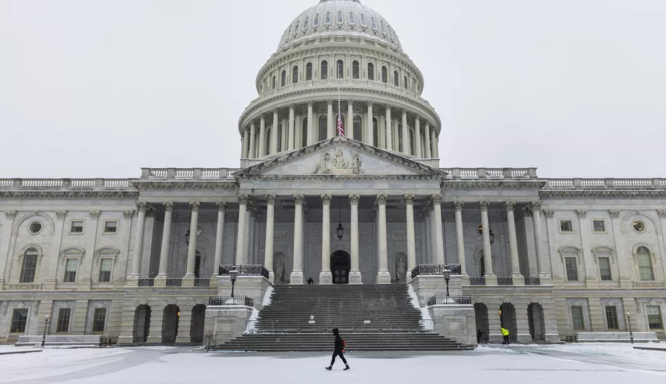 epaselect epa11809505 A person walks past the US Capitol as lawmakers gather to certify President-elect Trump's election victory in Washington, DC, USA, 06 January 2025. The certification comes exactly four years after a mob of Trump-supporting insurrectionists stormed the Capitol, attempting to disrupt the certification of US President Joe Biden. EPA/JIM LO SCALZO