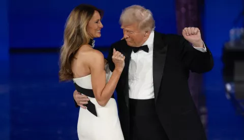 epa11841159 US President Donald Trump (R) and First Lady Melania Trump dance at the Liberty Ball, one of the events being held following US President Donald Trump's inauguration in Washington, DC, USA, 20 January 2025. Trump, who defeated Vice President Kamala Harris to become the 47th president of the United States, was sworn in earlier in the day, though the planned outdoor ceremonies and events were cancelled due to extremely cold temperatures. EPA/MAASNI SRIVASTAVA