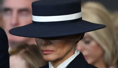 epa11839614 US First Lady Melania Trump stands for a benediction after President Donald Trump was sworn in as the 47th US President in the US Capitol Rotunda in Washington, DC, USA, 20 January 2025. EPA/SAUL LOEB/POOL