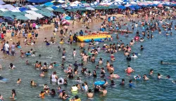 epa11800244 Tourists enjoy the beach at a resort in Acapulco, Guerrero, Mexico, 30 December 2024 (issued 31 December 2024). The Mexican port city of Acapulco closed the year of 2024 with a recovery of around 65 percent of its tourist accommodations after suffering from two of the most devastating hurricanes in the country's recent history; Otis in October 2023 and John last September. EPA/DAVID GUZMAN