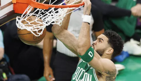 epa10654535 Boston Celtics forward Jayson Tatum (L) dunks the ball over Miami Heat guard Kyle Lowry (R) during the first quarter of the Eastern Conference Finals playoff game five between the Boston Celtics and the Miami Heat at TD Garden in Boston, Massachusetts, USA, 25 May 2023. The Miami Heat lead the best of seven series 3-1. EPA/CJ GUNTHER SHUTTERSTOCK OUT