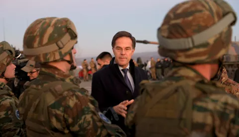 epa11786014 NATO Secretary General Mark Rutte (C) meets with soldiers during his visit to the military camp 'Novo Selo' in Bulgaria, 19 December 2024. NATO Secretary General Rutte paid a visit to the training center to address troops from the NATO Multinational Battle Group. EPA/VASSIL DONEV