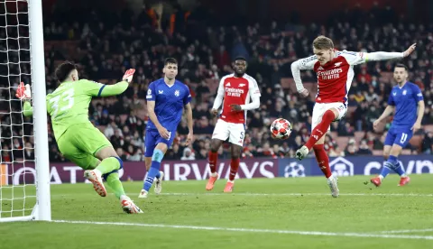 epa11845978 Martin Odegaard (R) of Arsenal scores his team's third goal during the UEFA Champions League league phase match between Arsenal FC and GNK Dinamo Zagreb, in London, Britain, 22 January 2025. EPA/TOLGA AKMEN