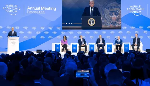 epa11847601 US President Donald J. Trump is shown on a screen as he addresses via remote connection a plenary session in the Congress Hall, above (L-R) German Klaus Schwab, Founder and Executive Chairman of the World Economic Forum, WEF, Ana Botin, Executive director of Spanish Santander Bank, Brian Moynihan, Chair and Chief Executive Officer of the Bank of America, Patrick Pouyanne, Chairman of the Board and Chief Executive Officer of French energy group TotalEnergies, Stephen A. Schwarzman, Chairman, Chief Executive Officer and Co-Founder of Blackstone Group, and Norwegian Borge Brende President, Member of the Managing Board of the World Economic Forum, WEF, during the 55th annual meeting of the World Economic Forum (WEF) in Davos, Switzerland, 23 January 2025. The World Economic Forum annual meeting brings together entrepreneurs, scientists, corporate and political leaders in Davos and takes place from January 20 to 24. EPA/MICHAEL BUHOLZER