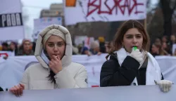 epa11820573 Protesters blow whistles during a protest rally in Belgrade, Serbia, 12 January 2025. University students staged a protest in front of the Constitutional Court asking for accountability after fifteen people lost their lives in the collapse of the Novi Sad Railway Station canopy on 01 November 2024. The station building, which had been renovated and reopened on 05 July 2024, was undergoing further renovations shortly before the collapse.  EPA/ANDREJ CUKIC