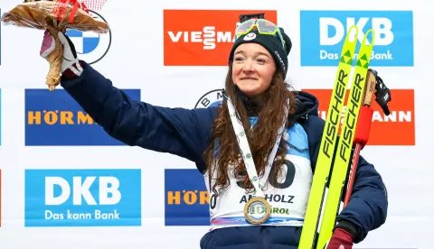 epa11847486 Winner Lou Jeanmonnot of France celebrates on the podium for the Women's 7.5km Sprint race at the IBU Biathlon World Cup in Antholz/Anterselva, Italy, 23 January 2025. EPA/ANDREA SOLERO