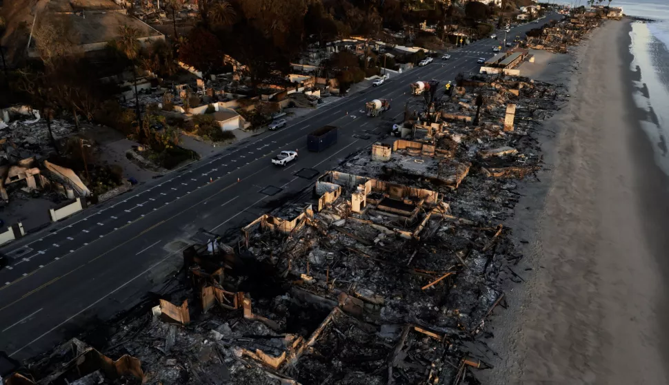 epaselect epa11827724 A photo taken by a drone shows an aerial view of a neighborhood destroyed by the Palisades wildfire in Malibu, California, USA, 15 January 2025. Multiple wildfires, which have already destroyed thousands of homes and forced the evacuation of numerous neighborhoods, continue to burn across thousands of acres in Southern California, including the Los Angeles area. EPA/TED SOQUI