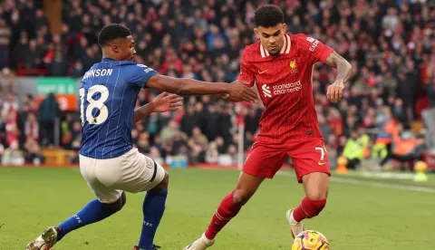 epa11852274 Ben Johnson of Ipswich Town (L) in action against Luis Diaz of Liverpool (R) during the English Premier League match between Liverpool FC and Ipswich Town, in Liverpool, Britain, 25 January 2025. EPA/ADAM VAUGHAN EDITORIAL USE ONLY. No use with unauthorized audio, video, data, fixture lists, club/league logos, 'live' services or NFTs. Online in-match use limited to 120 images, no video emulation. No use in betting, games or single club/league/player publications.