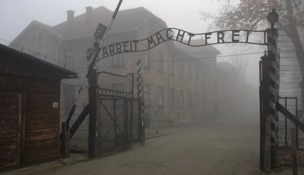 epa08149659 A handout photo made available by the Auschwitz Memorial and Museum shows the 'Arbeit macht Frei' gate ('Work sets free) at the former German Nazi concentration and extermination camp Auschwitz I in Oswiecim, Poland, 21 November 2006 (issued 22 January 2020). Auschwitz-Birkenau, the largest German Nazi concentration and death camp, was liberated by the Soviet Red Army on 27 January 1945 and the day is commemorated as International Holocaust Remembrance Day worldwide. The biggest German Nazi death camp KL Auschwitz-Birkenau was a complex of over 40 concentration and extermination camps operated by Nazi Germany near Oswiecim in occupied Poland during World War II, and a central site in the Nazis' plan to the so-called 'Final Solution' and the Holocaust (Shoa). It is estimated that 1.3 million people were sent to Auschwitz, and 1.1 million died there including 960,000 Jews, 74,000 non-Jewish Poles, 21,000 Roma people, 15,000 Soviet prisoners of war, and up to 15,000 other Europeans. Prisoners who were not gassed in chambers died of starvation, exhaustion, disease, individual executions, beatings or were killed during medical experiments. Since 1947, the site houses a memorial and museum that also offers guided tours and an education center to deepen the peoples' knowledge about the mass atrocities committed at the Nazi camps. EPA/PAWEL SAWICKI/www.auschwitz.org/HANDOUT ATTENTION: This Image is part of a PHOTO SET HANDOUT EDITORIAL USE ONLY/NO SALES