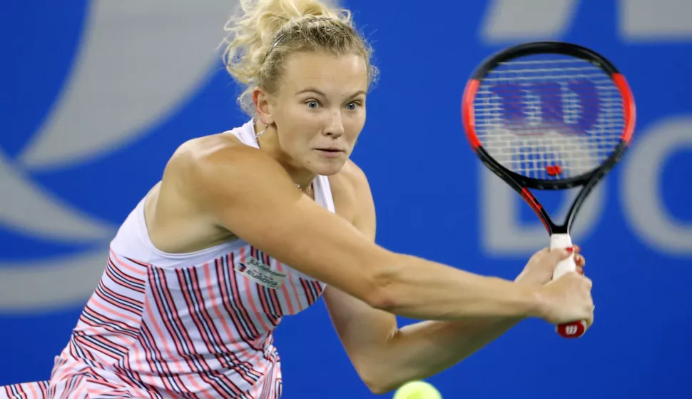 epa07050914 Katerina Siniakova of the Czech Republic in action against Anett Kontaveit of Estonia during their quarter final match at the 2018 WTA Wuhan Open tennis tournament in Wuhan, China, 27 September 2018. EPA/WU HONG