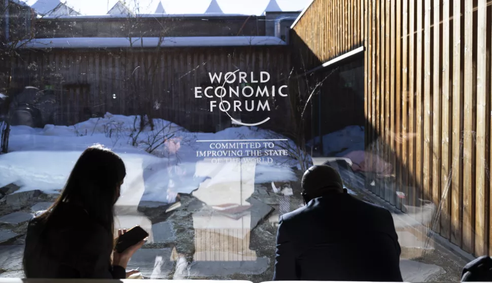 epa11842210 The World Economic Forum (WEF) emblem displayed on a window during the 55th annual World Economic Forum (WEF) meeting in Davos, Switzerland, 21 January 2025. The World Economic Forum's annual meeting gathers entrepreneurs, scientists, and corporate and political leaders in Davos from January 20 to 24.  EPA/LAURENT GILLIERON