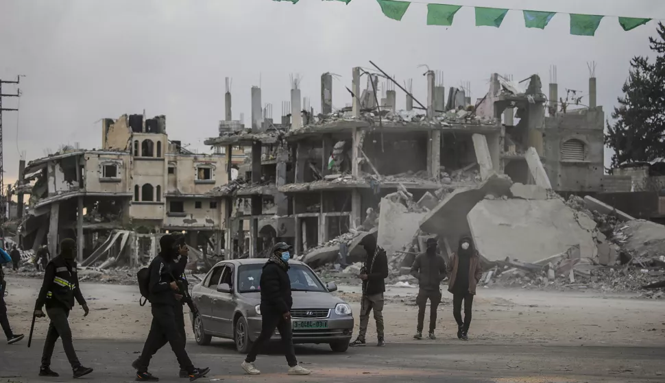 epa11845042 Hamas security men patrol the streets as humanitarian aid trucks cross into Rafah amid a ceasefire between Israel and Hamas, in the east of Rafah, southern Gaza Strip, 22 January 2025. According to the UN, hundreds of humanitarian aid trucks have entered the Gaza Strip since Israel and Hamas implemented the first phase of a hostage release and ceasefire deal on 19 January 2025. EPA/MOHAMMED SABER