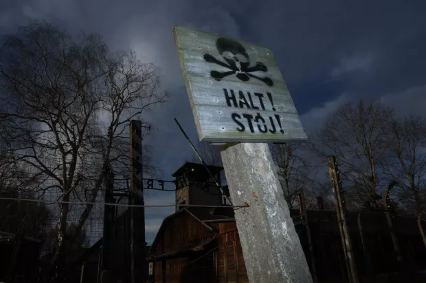 epa11856845 A sign reads 'Stop!' at the area of the former Auschwitz camp in Oswiecim on the 80th anniversary of the liberation of the German Nazi concentration and extermination camp Auschwitz-Birkenau, in Oswiecim, Poland, 27 January 2025. The largest of the German Nazi death camps, KL Auschwitz-Birkenau, was liberated by the Soviet Red Army on 27 January 1945. The world commemorates its liberation by observing International Holocaust Remembrance Day annually on 27 January. EPA/LESZEK SZYMANSKI POLAND OUT