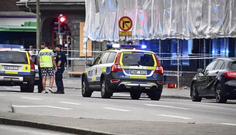 epa06819812 Police stand next to a cordon after several people were wounded by gunfire in central Malmo, southern Sweden, 18 June 2018, according to media reports quoting Swedish police. EPA/Johan Nilsson/TT SWEDEN OUT