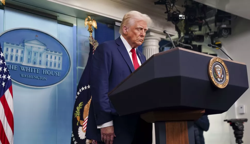 epa11864004 US President Donald Trump pauses for a moment of silence at the start of a press conference called in response to the fatal collision of a passenger airplane and a US military helicopter the previous night in Washington, DC, USA, 30 January 2025. DC Fire and EMS Chief John Donnelly said no survivors are expected following the collision of an American Eagle Flight, with 60 passengers and four crew members on board, with a US Army Black Hawk helicopter carrying three US service members late on 29 January, over the Potomac River near Reagan Washington National Airport. EPA/WILL OLIVER