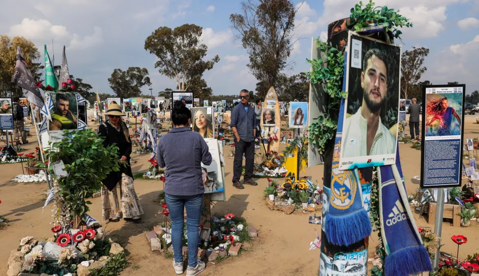 epa11866228 People visit a memorial site for the victims of the Hamas attack at the Supernova Music Festival on 07 October 2023, near Kibbutz Re'im, at the Israel-Gaza border, southern Israel, 31 January 2025. More than 46,000 Palestinians have been killed in the Gaza Strip, according to the Palestinian Ministry of Health, since Israel launched a military campaign in the strip in response to a cross-border attack led by the Palestinian militant group Hamas on 07 October 2023, in which about 1,200 Israelis were killed and more than 250 taken hostage. EPA/ABIR SULTAN