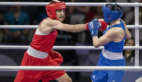 Algeria's Imane Khelif (in red) and Italy's Angela Carini during their women's 66kg preliminaries round of 16 boxing match during the Paris 2024 Olympic Games at the North Paris Arena, in Villepinte on August 1, 2024. Female boxer yells 'this is unjust' and falls to her knees in tears as she quits fight against 'biologically male' Olympic opponent Imane Khelif after just 46 seconds following two powerful punches. Photo by Eliot Blondet/ABACAPRESS.COM Photo: Blondet Eliot/ABACA/ABACA