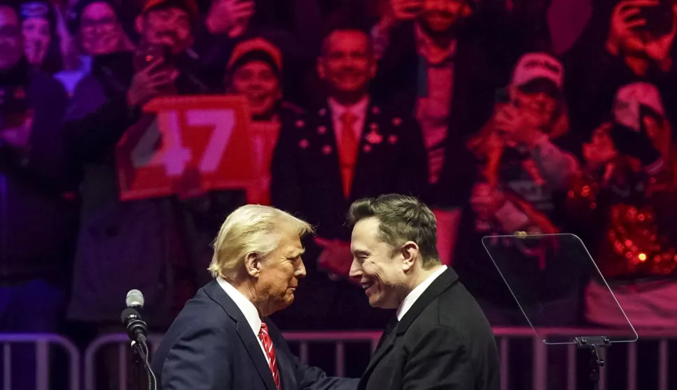 epaselect epa11837518 US President-elect Donald Trump (L) with businessman Elon Musk (R) on stage during a rally at Capital One Arena in Washington, DC, USA, 19 January 2025. President-elect Donald Trump, who defeated Joe Biden to become the 47th president of the United States, will be inaugurated on 20 January, though all of the planned outdoor ceremonies and events have been cancelled due to a forecast of extreme cold temperatures. EPA/WILL OLIVER