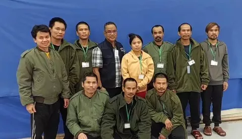 epa10993592 A handout photo made available by the Thai Ministry of Foreign Affairs shows 10 Thai migrant workers were released by the militant group Hamas posing for a group photo with a Thai official (C) in Tel Aviv, Israel, late of 24 November 2023. Hamas released 10 Thai migrant workers who were abducted in Gaza on 07 October 2023, following the Israel and Hamas four-day ceasefire agreement. EPA/THAI MINISTRY OF FOREIGN AFFAIRS/HANDOUT EDITORIAL USE ONLY/NO SALES HANDOUT EDITORIAL USE ONLY/NO SALES HANDOUT EDITORIAL USE ONLY/NO SALES