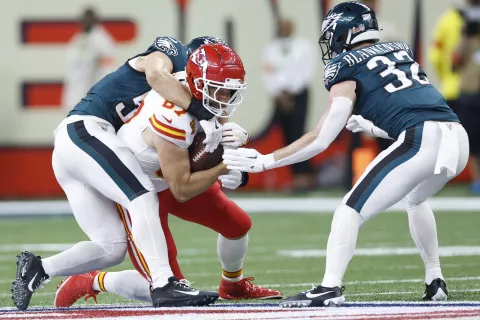 epa11885507 Kansas City Chiefs tight end Travis Kelce (C) gets tackled against the Philadelphia Eagles during the second half of Super Bowl LIX between the Kansas City Chiefs and the Philadelphia Eagles at Caesars Superdome in New Orleans, Louisiana, USA, 09 February 2025. The Super Bowl is the annual championship game of the NFL between the AFC Champion and the NFC Champion and has been held every year since 1967. EPA/ERIK S. LESSER
