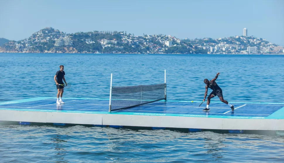 epaselect epa11917044 Danish tennis player Holger Rune (L) and American player Frances Tiafoe (R) participate during an exhibition game prior to the start of activities for the Mexican Open Tennis, which will take place from 24 February to 01 March in Acapulco, the state of Guerrero, Mexico, 22 February 2025. EPA/DAVID GUZMAN