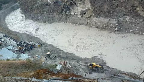 epa08993669 A general view of a rescue operation near the Dhauliganga hydro power project after a portion of Nanda Devi glacier broke off, at Reni village in Chamoli district, Uttrakhand, India, 07 February 2021. Over 100 people are feared dead after part of the Nanda Devi glacier broke off causing massive floods in the Tapovan area of Uttarakhand's Chamoli district. EPA/ARVIND MOUDGIL -- BEST QUALITY AVAILABLE --