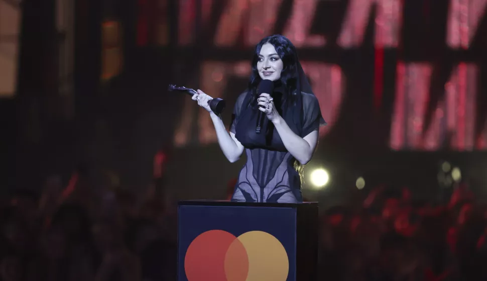 epa11933479 British singer Charlie XCX accepts the Song of the Year award during the 2025 BRIT Awards ceremony at The O2 arena in London, Britain, 01 March 2025. The annual pop music awards are presented by the British Phonographic Industry (BPI). EPA/NEIL HALL