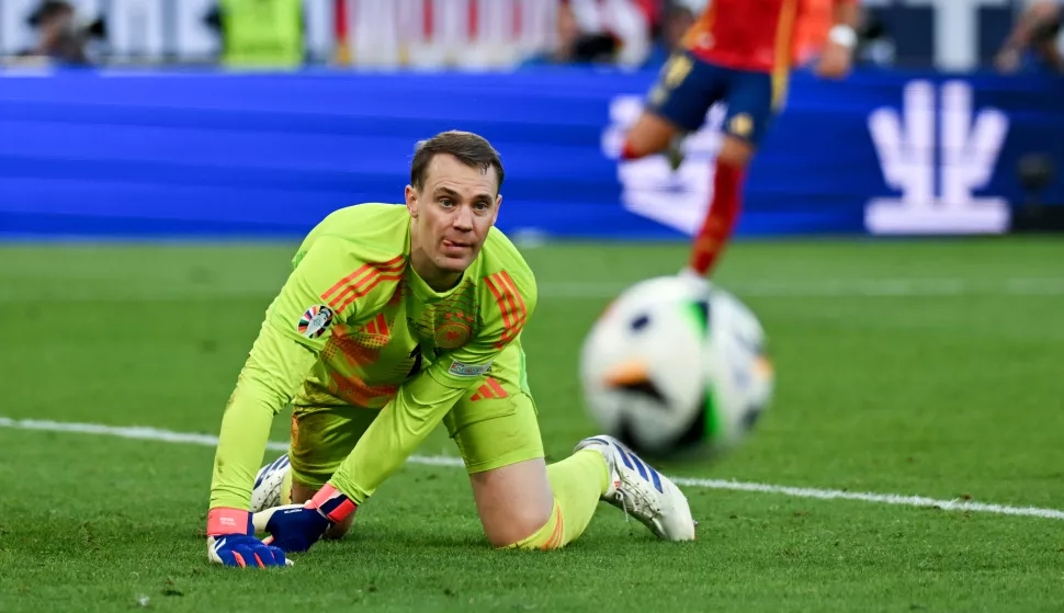 05 July 2024, Baden-W?rttemberg, Stuttgart: Soccer, UEFA Euro 2024, Spain - Germany, final round, quarter-final, Stuttgart Arena, Germany's goalkeeper Manuel Neuer looks after the ball. Photo: Marijan Murat/dpa Photo: Marijan Murat/DPA