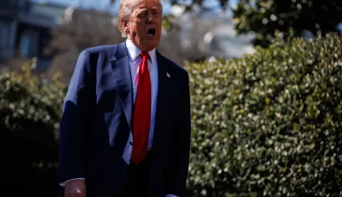 epa11957102 US President Donald Trump speaks in front of a group of Tesla vehicles on the South Lawn of the White House in Washington, D.C., USA, 11 March 2025. President Trump has said he will buy a Tesla to support Tesla and Elon Musk after recent attacks on Tesla charging stations and calls for boycotts of Tesla products. EPA/SAMUEL CORUM/POOL