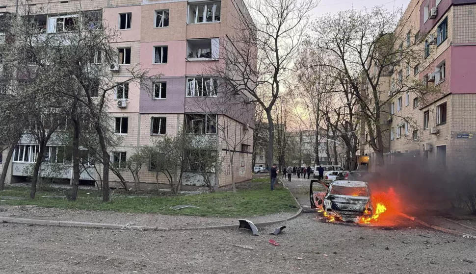 epa12009952 A handout picture made available by the State Emergency Service shows a car burning at the site of a rocket strike in Kryvyi Rih, Ukraine, 04 April 2025, amid the ongoing Russian invasion. At least 14 people were killed, including six children, and more than 50 others were injured after a Russian shelling on Kryvyi Rih, the State Emergency Service reported. EPA/STATE EMERGENCY SERVICE HANDOUT HANDOUT EDITORIAL USE ONLY/NO SALES