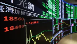 epa12019603 Screens display stock values inside the Taiwan Stock Exchange Office in Taipei, Taiwan, 09 April 2025. The main index of the Taiwan Stock Exchange on 09 April opened lower by 122.51 points at 18,337.44, with a trading volume of 12.56 billion New Taiwan Dollars (300.8 million US dollars), despite government stabilization fund intervention. EPA/RITCHIE B. TONGO