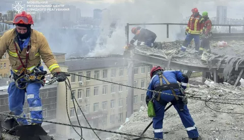 epa12013365 A handout picture made available by the State Emergency Service shows Ukrainian rescuers working at the site of a rocket strike in Kyiv, Ukraine, 06 April 2025, amid the ongoing Russian invasion. At least one person died and three other people were injured after an overnight combined rocket and shock drone attacks in Kyiv, according to the State Emergency Service report. Russian troops entered Ukrainian territory on 24 February 2022, starting a conflict that has provoked destruction and a humanitarian crisis. EPA/STATE EMERGENCY SERVICE HANDOUT HANDOUT HANDOUT EDITORIAL USE ONLY/NO SALES