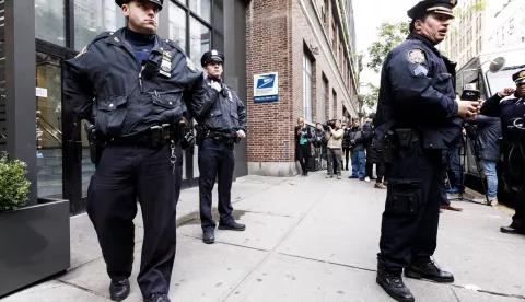 epa07121595 Police officers stand outside of a US post office where another suspicious package was discovered and removed by the New York Police Department's bomb squad in New York, New York, USA, 26 October 2018. In recent days packages containing pipe bombs were sent to several prominent figures across the country, sparking a sprawling nationwide investigation. EPA/JUSTIN LANE
