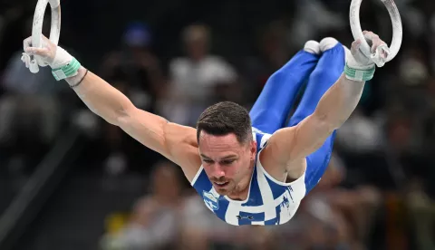 (240804) -- PARIS, Aug. 4, 2024 (Xinhua) -- Eleftherios Petrounias of Greece competes during the men's rings final of artistic gymnastics at the Paris 2024 Olympic Games in Paris, France, Aug. 4, 2024. (Xinhua/Cheng Min) Photo: Cheng Min/XINHUA